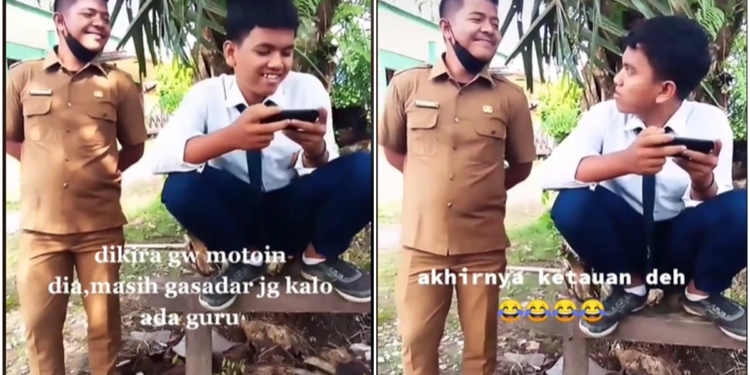 Terlalu asyik bermain game, murid ini tak sadar gurunya berada di belakang